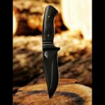 Close-up of the razor-sharp curved blade of the Prime Damascus skinning knife